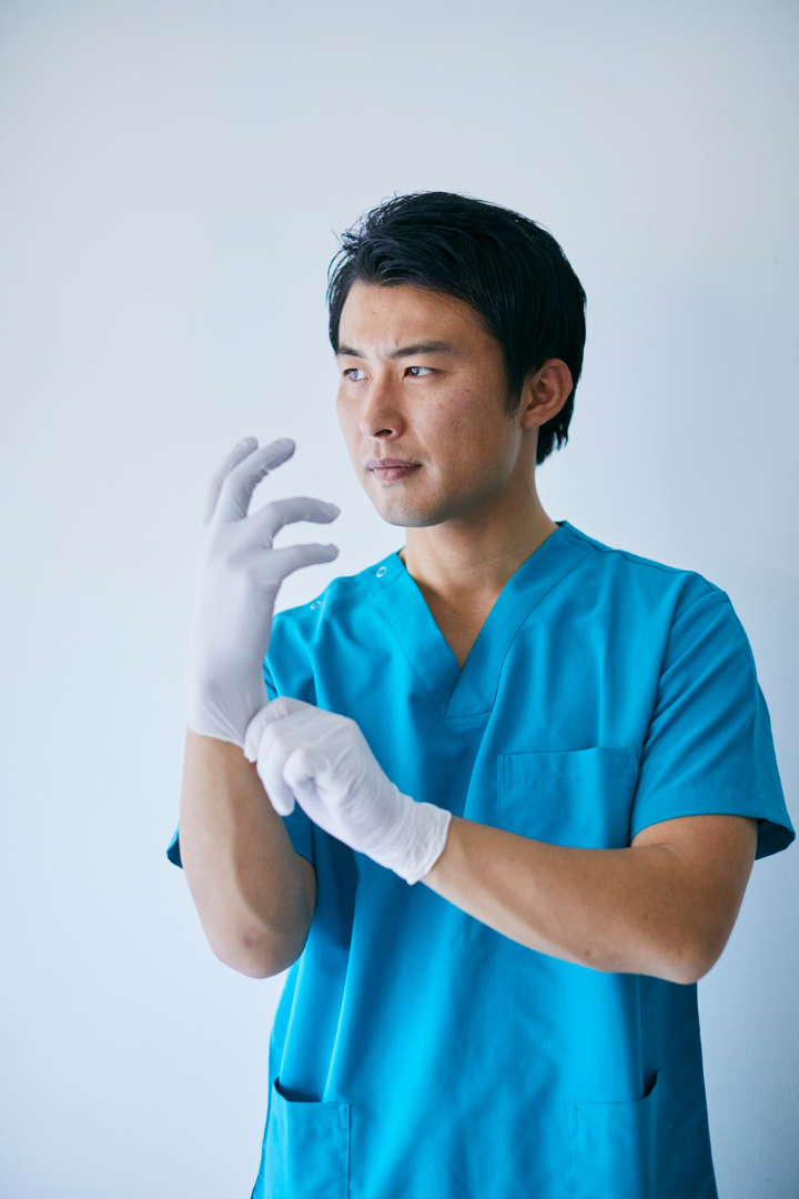 Professional caregiver assisting elderly resident at Genesis Life Care